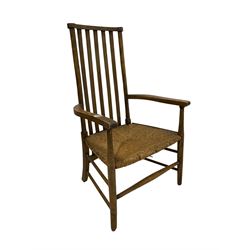 Early 20th century beech armchair, high slatted back with shaped arms and rush seat