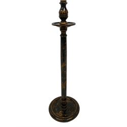 Early 20th century chinoiserie lacquered standard lamp, decorated with gilt figures in boats and buildings on a black background (D30cm H142cm); Early to mid-20th century brass standard lamp, pineapple finial above shade, twin branch on reeded column with gadroon detail, on circular base (D30cm H125cm)