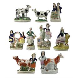 Victorian Staffordshire cow creamer, matched pair of Staffordshire figures modelled as a  milkmaid and cow herd, pocket watch stand, flatbacks etc (9)