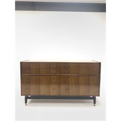 G-Plan - 'Librenza' tola wood sideboard, fitted with eight drawers, raised on an ebonized base with brass feet. W 150cm, D 46cm, H 86cm.
