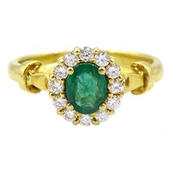 18ct gold oval emerald and round brilliant cut diamond cluster ring, stamped 750