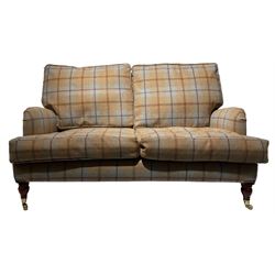 Howard design feather filled tartan pattern two seat sofa on Victorian style turned legs with castors