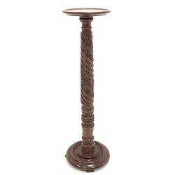 19th century and later mahogany torchere, circular top raised on spiral turned and leaf carved column, stepped circular base, H100cm