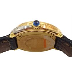 Cartier Trinity ladies 18ct gold quartz wristwatch, Ref. 2357, tricoloured gold case, white enamel dial with Roman numerals, blued steel hands and secret signature at 10, on original black leather strap with fold-over clasp, boxed with guarantee papers dated 1999