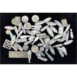 Collection of 19th century Chinese mother-of-pearl gaming counters in various shapes to include fish, pierced square design, circular with engraved figural decoration etc (qty) 