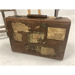Two pairs of vintage wooden ladders, wooden and metal bound bucket, two vintage rowing awes, blackmoor stand and a leather suitcase with old labels