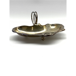 Silver kidney shape dish of Art Nouveau design with loop handle on ball feet W18cm Sheffield 1910 Maker Joseph Rodgers 6oz
