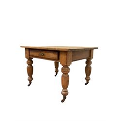 Victorian dining table, the pine top raised on satin walnut base with turned and fluted supports terminating in castors 107cm x 100cm, H76cm