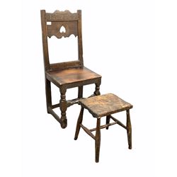 18th century oak side chair, the carved cresting rail bearing inscription 'I C 1737' over panel seat and raised on turned supports, together with rustic fruitwood stool