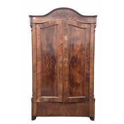 Continental mahogany veneered wardrobe, arched top over two panelled doors enclosing interior fitted for hanging W112cm, H186cm, D48cm