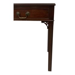 George III mahogany side table, rectangular top with moulded edge, fitted with two cock-beaded frieze drawers over pierced scrolled brackets, raised on moulded square supports with inner chamfer