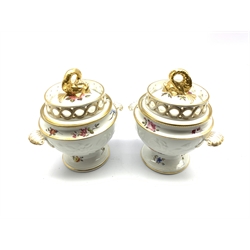 Pair Chamberlain Worcester sauce tureens and covers, the lid with pierced gallery and gilded dolphin-form knop, with shell-form handles, floral moulded body with foliate sprays and gilt details, H19cm 