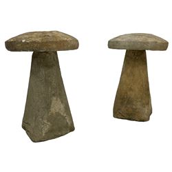 Two composite stone staddle stones 