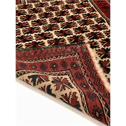 Persian runner rug, with repeating blue design on red field, (250cm x 56cm) together with a Persian prayer rug (90cm x 128cm)