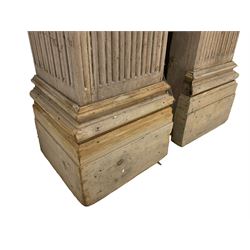 Pair early 19th century limewood architectural column or pilaster casings, square tapering form with stop fluted decoration, with stepped and moulded lower skirt