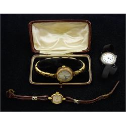 Early 20th century 9ct gold manual wind wristwatch, on gold expanding strap, stamped 9ct, Rotary 9ct gold wristwatch, on black leather strap and a silver manual wind wristwatch, London import marks 1918, on ribbon 