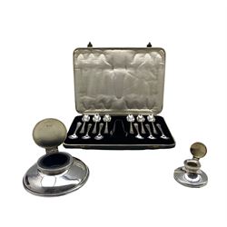 Set of twelve silver coffee spoons and tongs Sheffield 1926 Maker Francis Howard Ltd, cased, silver circular inkwell with hinged lid D13cm London 1924 and a small silver inkwell 