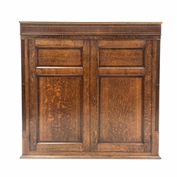 19th century oak cupboard, mahogany banded frieze with string inlay over two panelled doors revealing three fixed shelves, flanked by fluted pilasters, W118cm