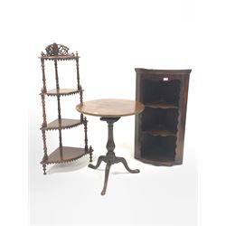 Georgian mahogany tilt top occasional table, single plank circular top with snap top and bird cage, turned column raised on three splayed supports (D59cm) together with a 19th century mahogany wall hanging cupboard with two open shelves, (H97cm) and a Victorian walnut four tier waterfall whatnot (H120cm) 