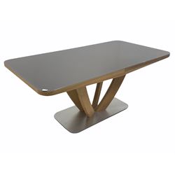Large contemporary Scandinavian style light oak veneered extending dining table, the frosted glass top raised on four bowed supports united by a brushed metal and silver painted base, with two additional leaves, 272cm/180cm x 95cm, H76cm