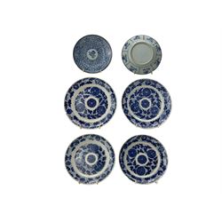 Set of four 19th century Chinese blue and white plates, painted with lotus flowers in bloom, agaist a foliate ground, D20cm together with another Chinese blue and white dish (5)