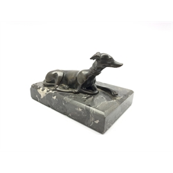 Desk paperweight in the form of a bronze recumbent greyhound on a veined grey marble base W13cm