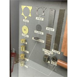 Nobel Industries Ltd London cartridge display board showing the various components and stages of cartridge production in an oak glazed case, 65cm x 78cm 
