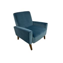 Mid-20th century design armchair, upholstered in ocean blue fabric, raised on oak square tapering supports