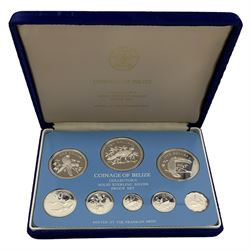 Coinage of Belize proof eight coin set, dated 1975,  all coins in sterling silver, from one cent to ten dollars and two Coinage of Belize proof eight coin sets, dated 1974 and 1975, from one cent to ten dollars, all produced by The Franklin Mint, all cased with certificates (3)