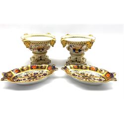 Pair of Royal Crown Derby Imari pattern oval shallow dishes L13.5cm and a pair of early 19th century Derby pot pourris decorated in Imari colours and on pedestal bases H10cm