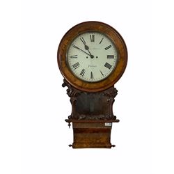 A mid Victorian twin Fusee wall clock with rack striking and recoil escapement, striking the hours on a coiled gong, painted steel twelve-inch white dial with Roman numerals and minute track, dial inscribed “Joseph Parker, Pudsey”, steel spade hands, brass spun bezel with flat glass, cylindrical pendulum bob and wooden rod, Anglo American style case in mahogany and burr walnut veneer, seventeen-inch diameter walnut dial surround with a clear glazed trunk and scroll carved surround, with a deep walnut veneered reverse ogee plinth and converse scroll base with finials, two movement side doors (one missing) and one pendulum door (missing).
Joseph Parker is recorded as working  in Greenside, Pudsey 1853-66.

With key and pendulum. 
