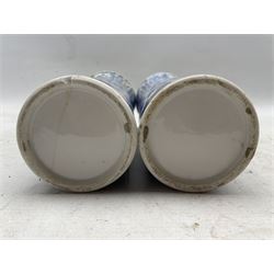 Pair of 19th century Chinese sleeve vases decorated in underglaze blue with scrolling Lotus, unmarked H25.5cm (both a/f)