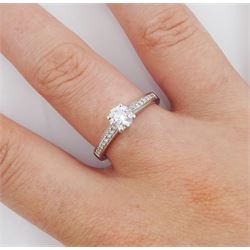 18ct white gold single stone round brilliant cut diamond ring, with diamond set shoulders, stamped 750, principal diamond 0.53 carat, diamond colour D, clarity VVS2, with GIA report