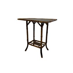 Bamboo side table, black lacquered rectangular top painted with birds and flowers, raised on splayed supports united by crossed undertier