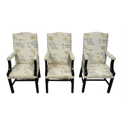 Set of six contemporary Georgian shape high back dining armchairs, ebonised hardwood framed, upholstered in pale fabric with postage mark pattern, on moulded square supports united by plain stretchers