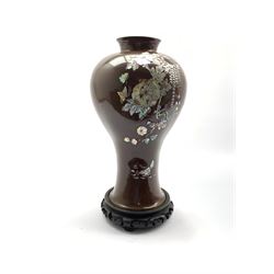Oriental lacquer and mother-of-pearl inlaid vase of inverted baluster form on stand, H33cm