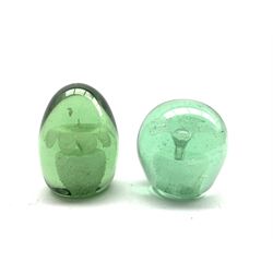 Two Victorian green glass dump paperweights, of domed and rounded form with internal flower inclusion, tallest H11cm (2)