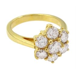 18ct gold seven stone round brilliant cut diamond daisy cluster ring, stamped 750, total diamond weight 2.17 carat
