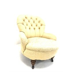 Victorian bedroom chair, upholstered in buttoned ivory damask, raised on turned front supports and castors, W67cm