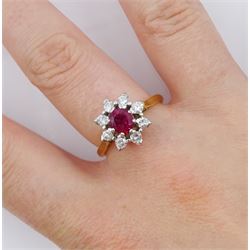 18ct gold oval cut ruby and round brilliant cut diamond cluster ring, London 1962