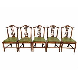 Set five George III country elm dining chairs, shaped crest rail over pierced splat and drop in upholstered seat pad, raised on square chamfered supports united by stretcher W52cm