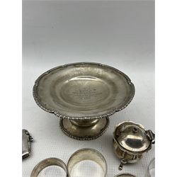 Small silver comport with presentation D14cm London 1919, four silver serviette rings, silver vesta case and a mustard pot 10oz