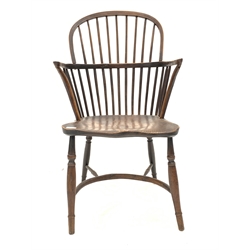 19th century yew and elm Windsor armchair, with hoop and spindle back, curved arm terminals, shaped saddle seat, raised on crinoline stretcher and turned supports
