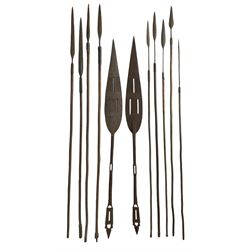 Nine African Zulu spears and a pair of wooden paddle clubs with hatch carved decoration L151cm (11)