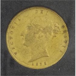 Queen Victoria 1872 gold half sovereign coin, die number 75, housed in a display case