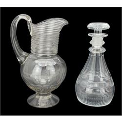 Victorian glass jug with applied spun glass neck and slice cut body on pedestal foot H26cm and a cut glass decanter (2)