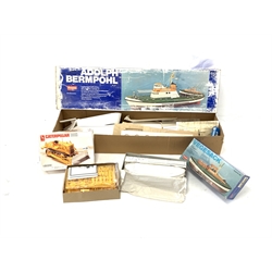 Graupner scale model boat kit 'Adolph Bermpohl No 2137, another boat kit 'Vegesack ' No 488 and an Ertl Caterpillar scale model kit