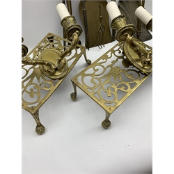 Reproduction brass lantern clock, number of brass fire irons, two brass trivets and other items