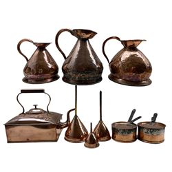 Three Victorian graduated copper haystack measures, the largest marked 'Hall 2 G', rectangular copper kettle, two small copper saucepans with lids and three copper funnels 