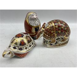 Three Royal Crown Derby paperweights comprising Armadillo, dated 1996, Santa, 1998 and Tortoise, 1995 (3)